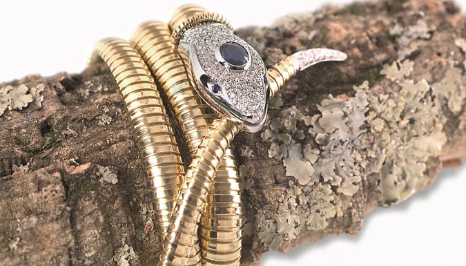 Fine art jewelry, bracelets tubogas snake model, 18k gold, diamonds and precious stone. 100% made in Italy