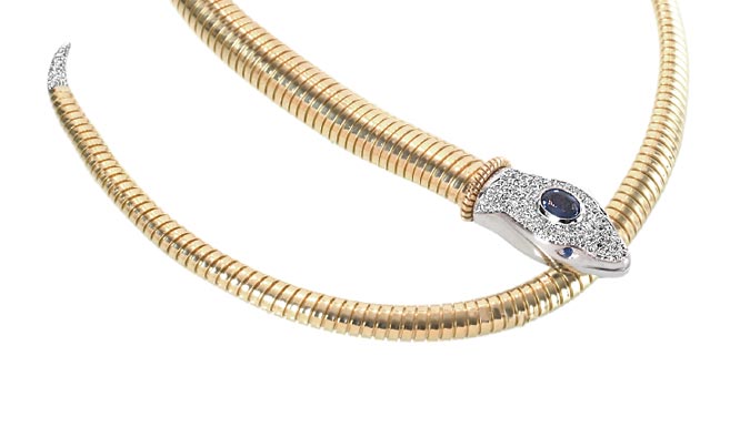 Fashion italian jewelry, bracelets tubogas snake model, 18k gold, diamonds and precious stone.
