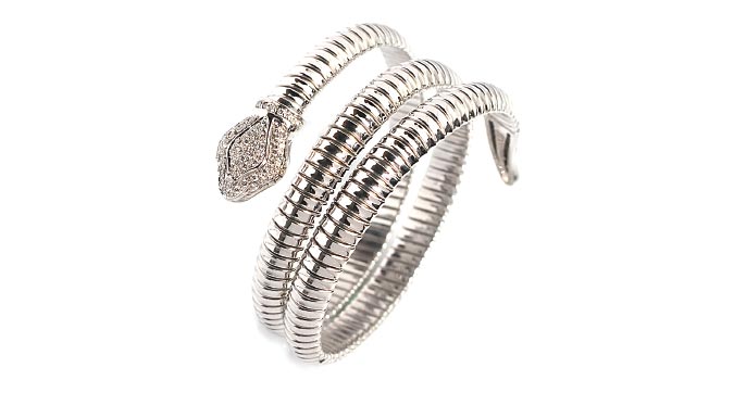 Three rounds snake model tubogas bracelets. 18k white gold and diamonds. 100 % made in Italy