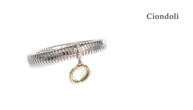 Bracciale tubogas in oro e diamanti. Produzione artigianale e design 100% made in Italy.