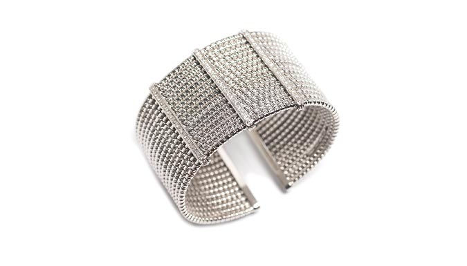 Bracciale tubogas in oro e diamanti. Produzione artigianale e design 100% made in Italy.