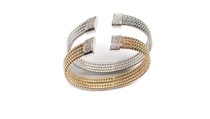 Bracciale tubogas in oro e diamanti. Produzione artigianale e design 100% made in Italy.