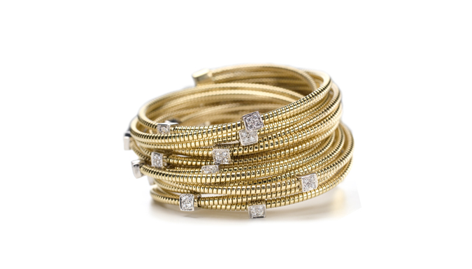 Bracciale tubogas in oro e diamanti. Produzione artigianale e design 100% made in Italy.