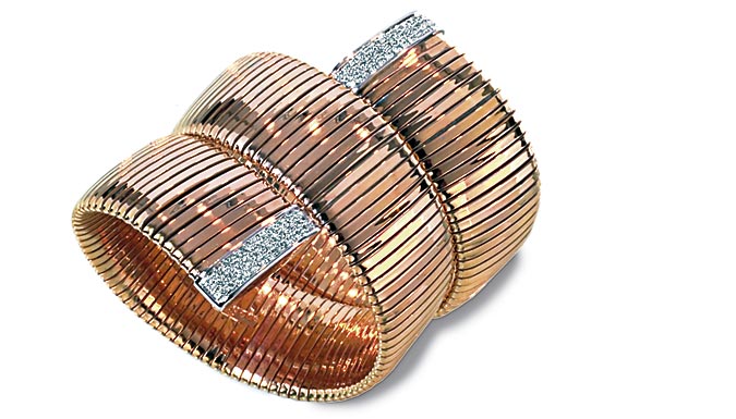 Bracciale tubogas in oro e diamanti. Produzione artigianale e design 100% made in Italy.