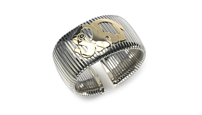 Bracciale tubogas in oro e diamanti. Produzione artigianale e design 100% made in Italy.